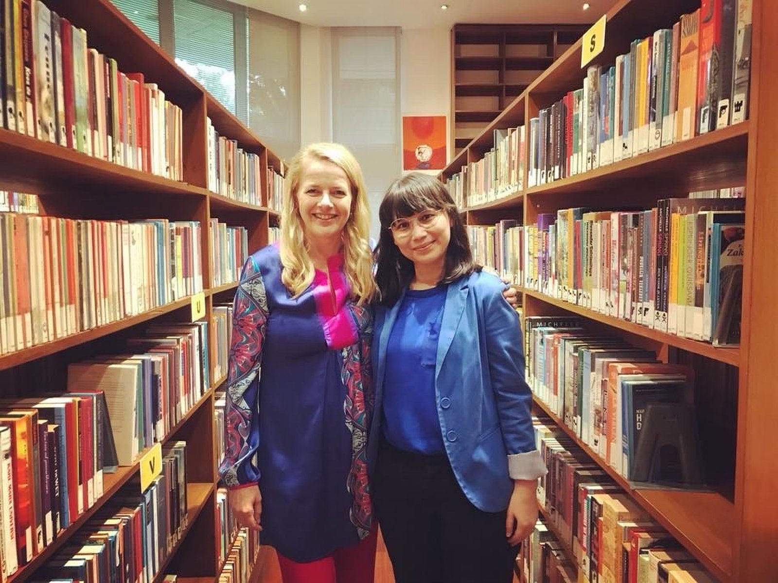 Rika Agusmelda on assignment in a library