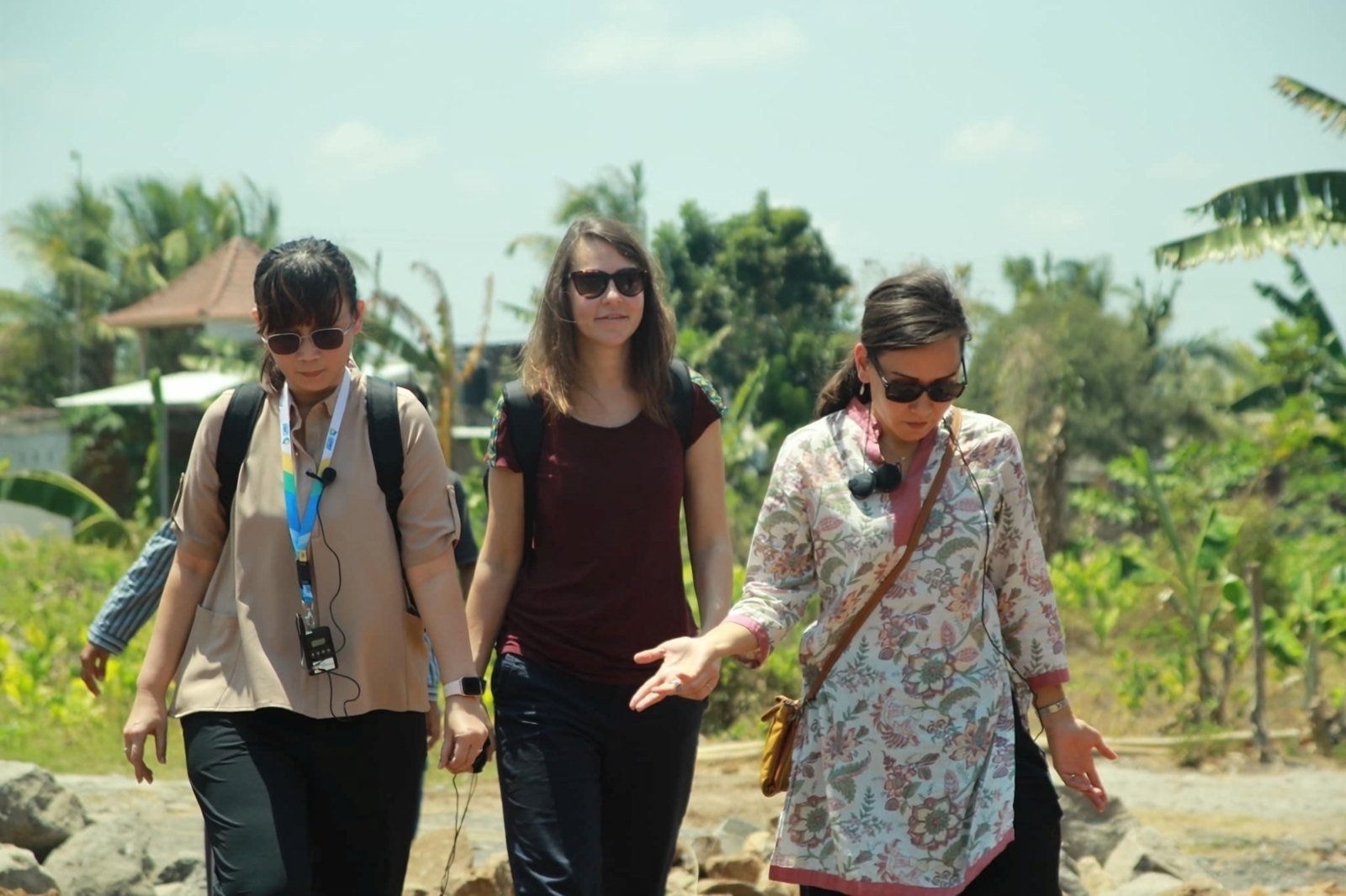 Rika Agusmelda interpreting while walking a site with guests